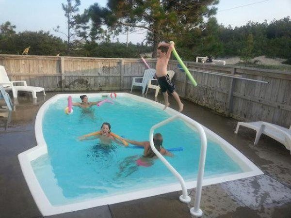 12-kid-hitting-girls-pool-day